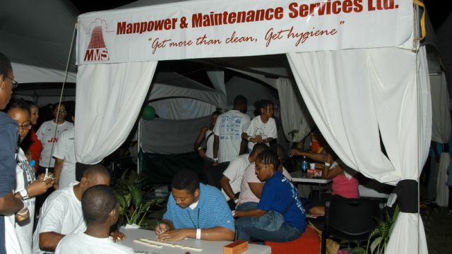Manpower supports the annual Relay for Life. Here team members take a break for dominoes.